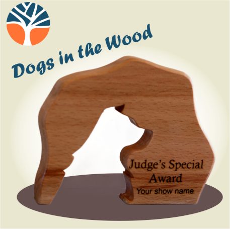 Wooden trophy cut from solid beech or oak with a silhouette of a dog's head cut through and engraved with your message.