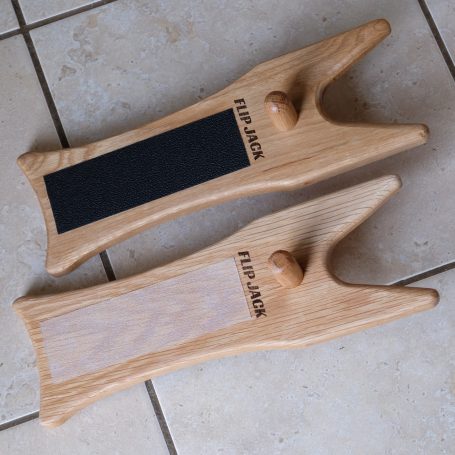 A boot jack with 2 sides, one for removing dirty boots and one for keeping socks clean.