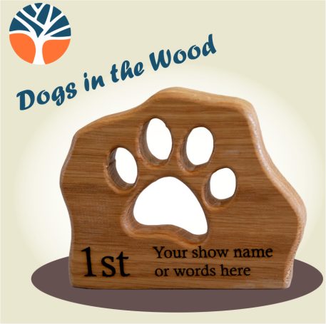 Wooden trophy cut from solid beech or oak with a paw print cut through and engraved with your message.